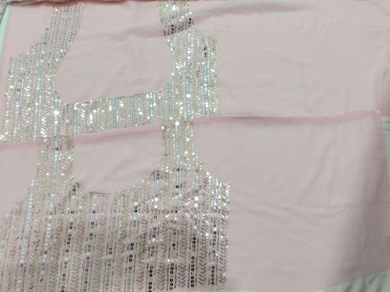 Omkar Tex's Light Pink color Faux georgette bridal lehenga choli with dupatta set for women